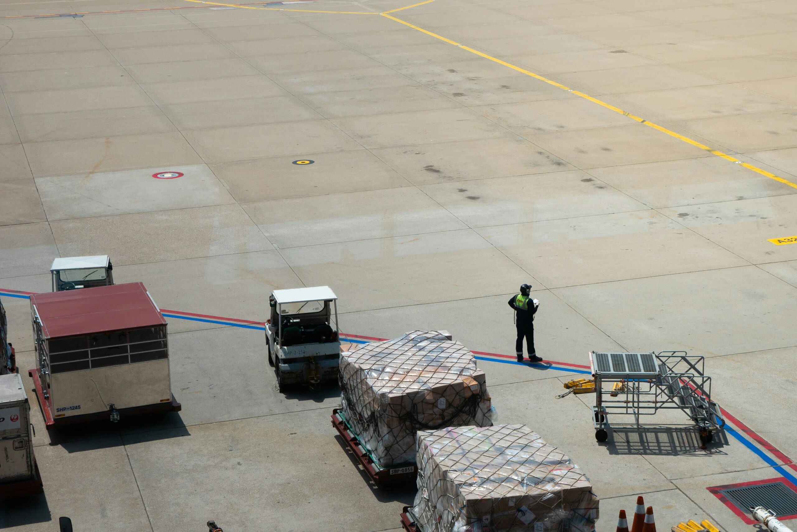 hardshell suitcase on airport conveyor