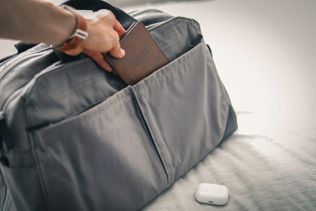 impact-resistant suitcase on airport conveyor