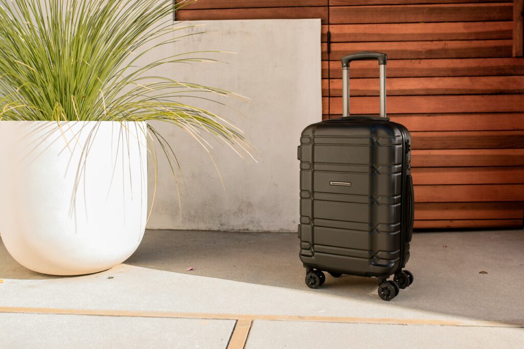 luxury suitcase on airport conveyor belt
