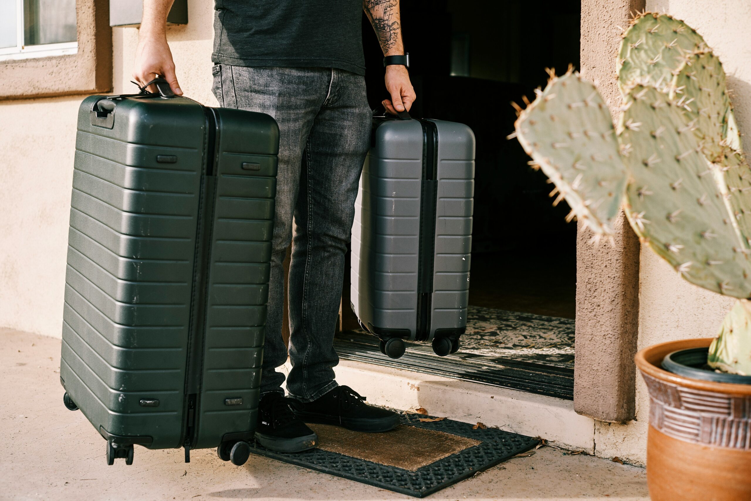 A damaged suitcase lying on airport floor