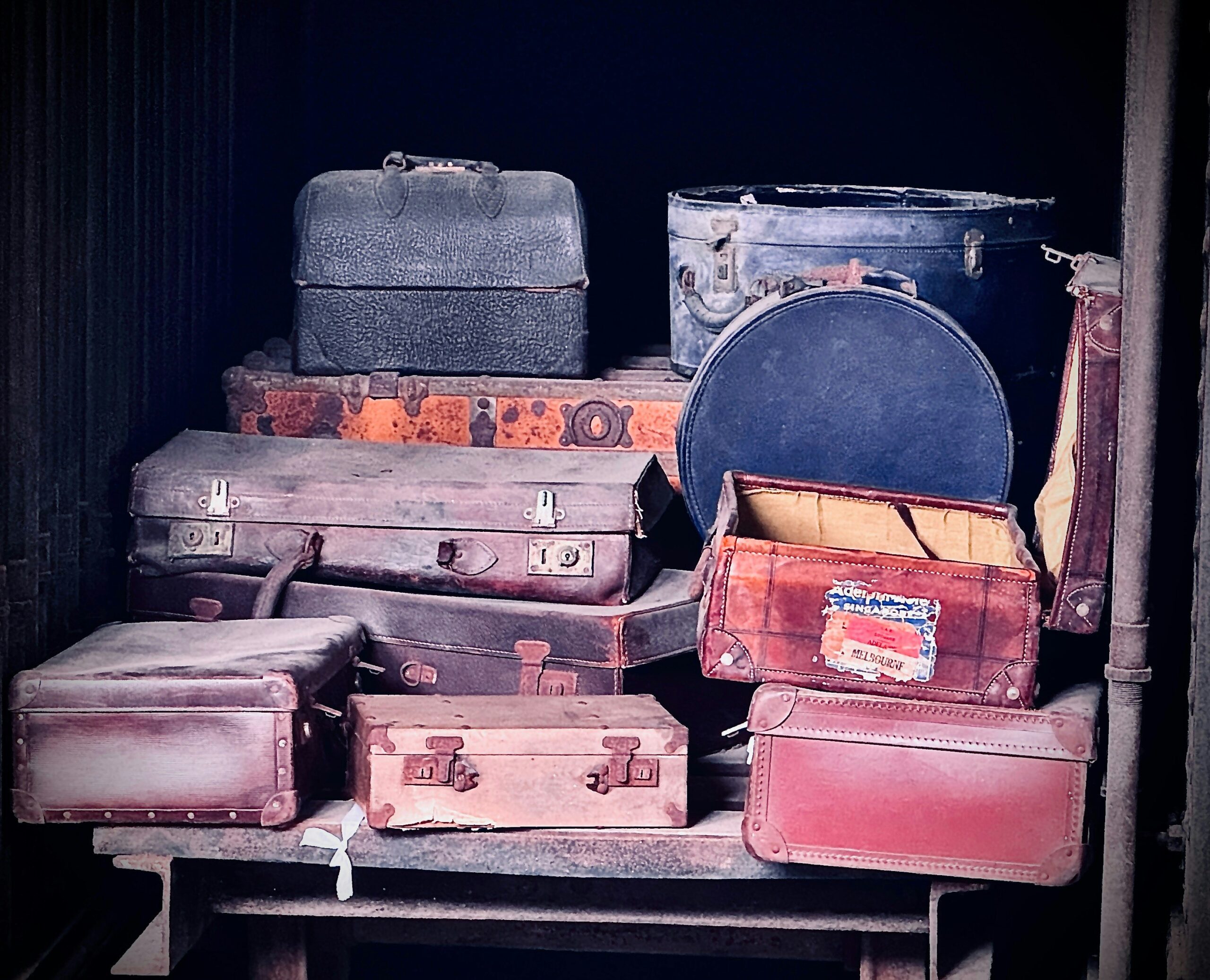 A durable hardshell suitcase being loaded onto a plane.