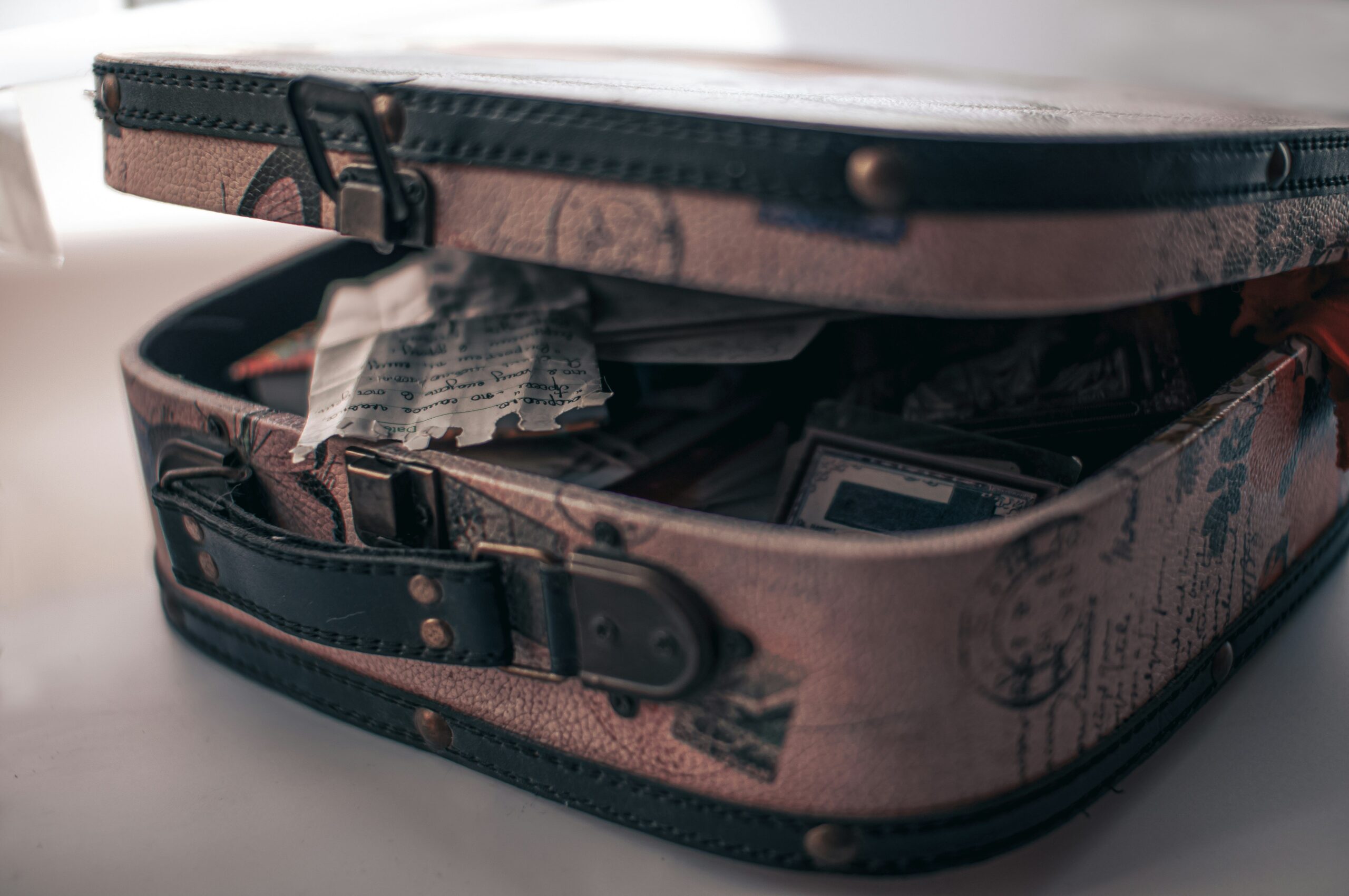 A side-by-side view of different brands of hardshell suitcases