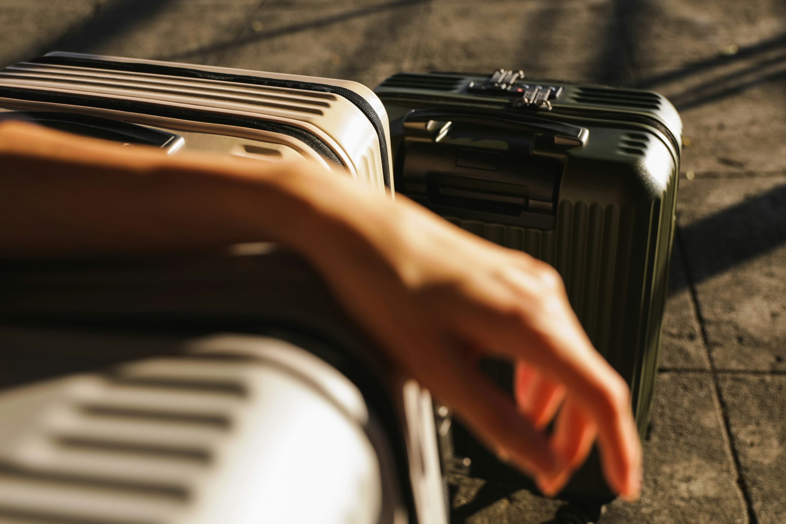 Close-up of spinner wheels on a compact hardshell carry-on being tested
