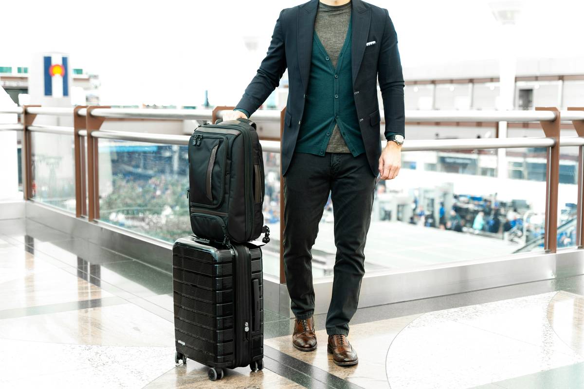 Before and after shots of a well-used yet pristine hardshell suitcase