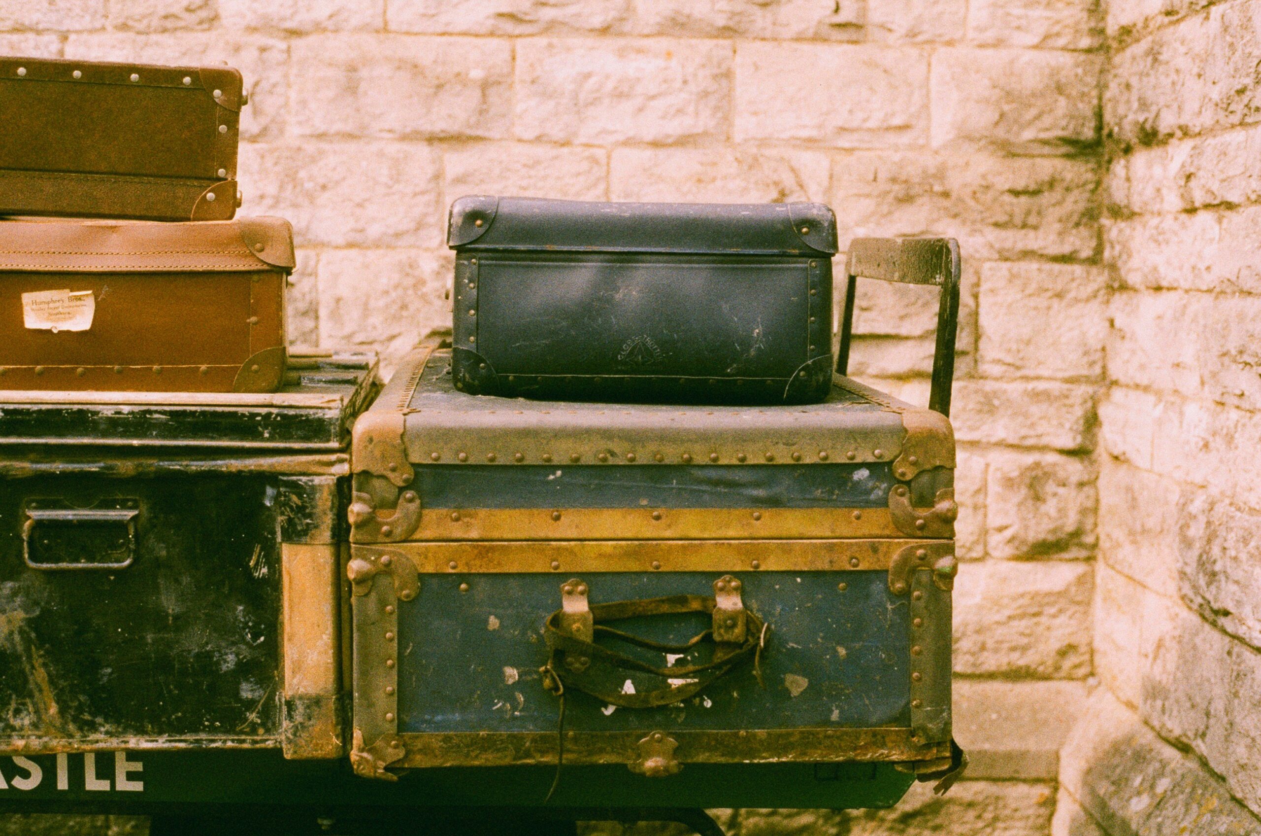 Close-up shot of silent glide wheels on a silver hardshell suitcase